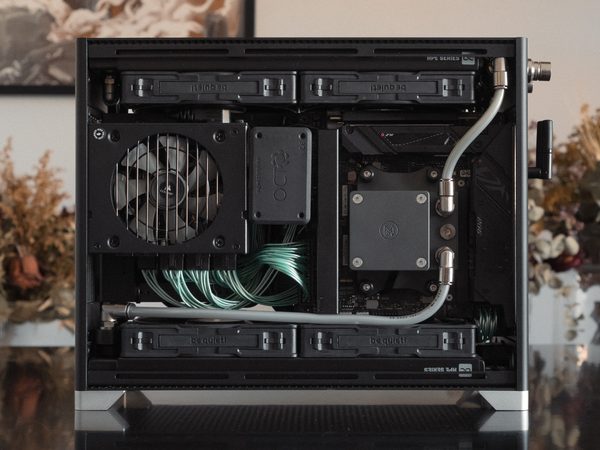 A Pantheon build with teal cabling, seen from the open side