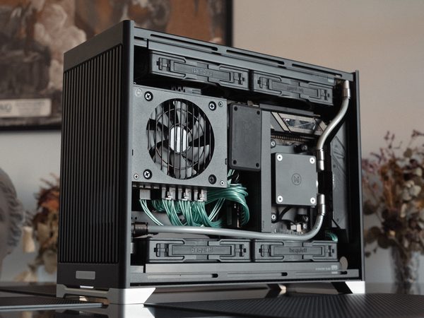 A Pantheon build with teal cabling, seen at an angle