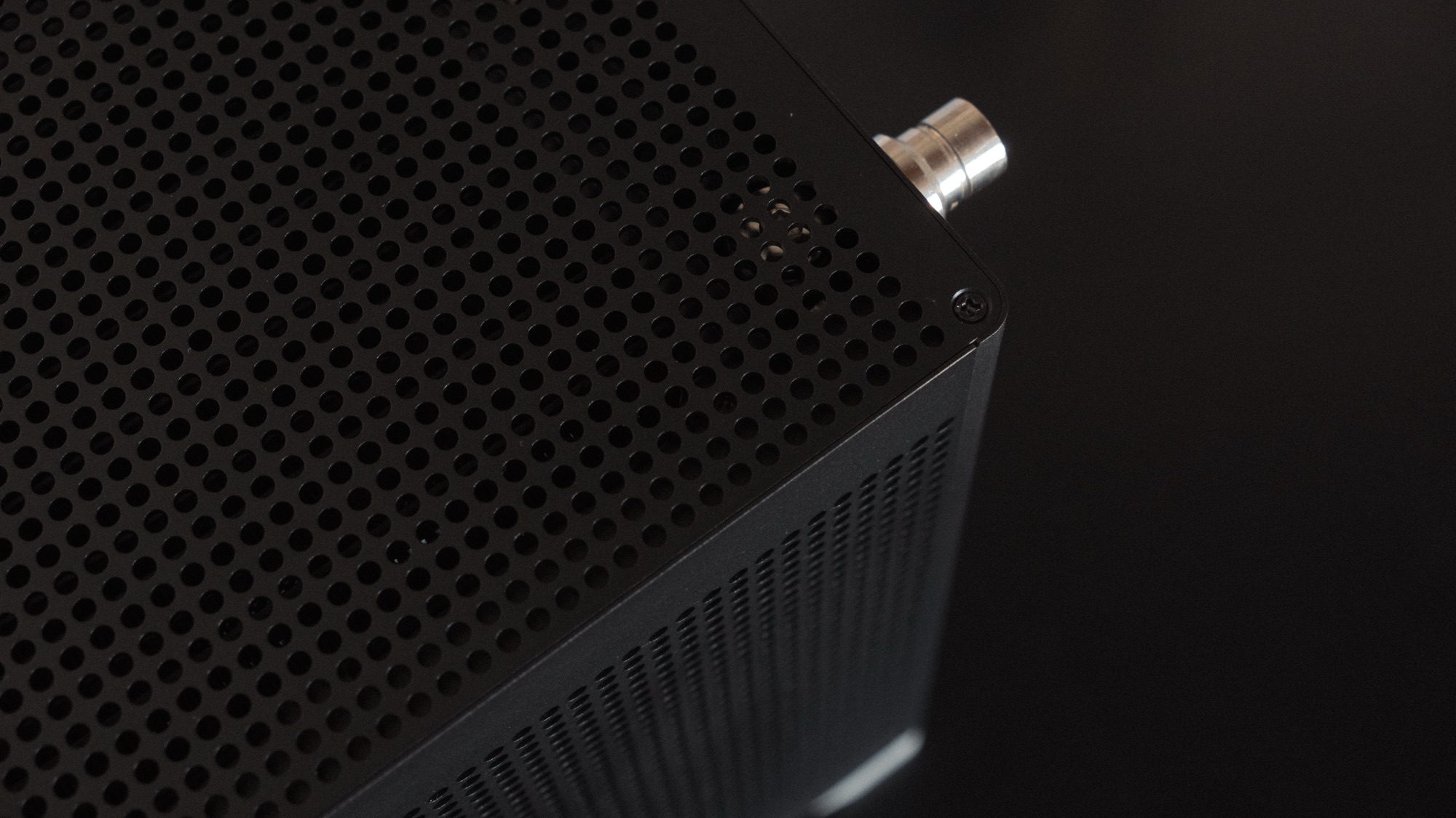 The Pantheon's perforated top panel with a quick disconnect, in black and white